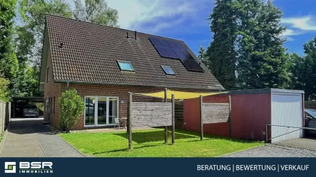 Hausansicht - Haus kaufen in Rheda-Wiedenbrück - Familiengerecht und ein top Energiewert!