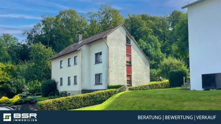 Hausansicht - Haus kaufen in Oerlinghausen - Familienfreundlich mit Wald- und Weitblick