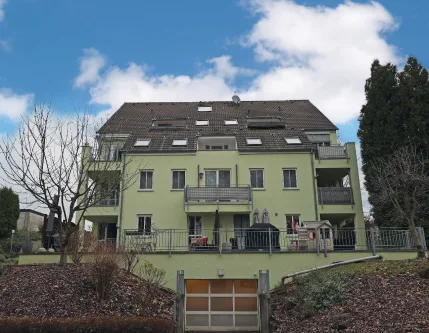 Rückansicht - Wohnung kaufen in Leverkusen - VERKAUFSSTART: Moderne Maisonette-Wohnung mit zwei Bädern, Südbalkon, TG-Stellplatz uvm.