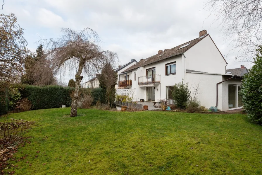 Rückansicht - Haus kaufen in Köln - Verkaufsstart in Köln-Buchheim: Großzügiges Reihenendhaus mit großem Garten und Garage