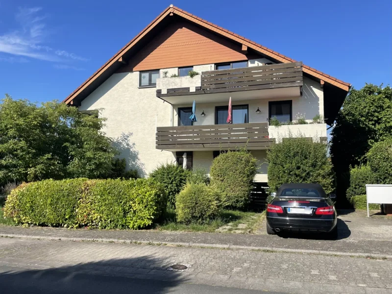 Ansicht - Wohnung kaufen in Bodenheim - Fabelhafte 4 Zi.-Wohnung mit zwei Balkonen, zwei Bädern und einem Kachelofen in Bodenheim!