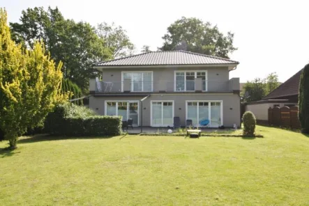 Rückseite - Haus kaufen in Bönningstedt - Diese Adresse bietet Stil und hohen Wohngenuss