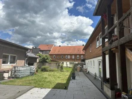 Expose  - Haus kaufen in Ohrdruf - Idyllisches Anwesen mit Sechs Wohneinheiten 