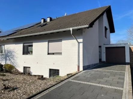 Außenansicht - Haus kaufen in Viersen - Charmantes Einfamilienhaus mit Einliegerwohnung 