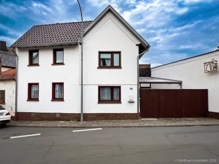  - Haus kaufen in Zülpich / Schwerfen - Eigenheim statt Miete! Attraktives kleines Haus mit Garten und Innenhof in Schwerfen ...