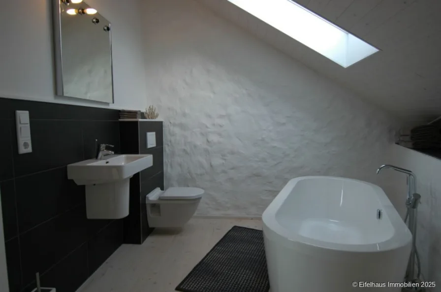 Wannenbad en suite 1. OG