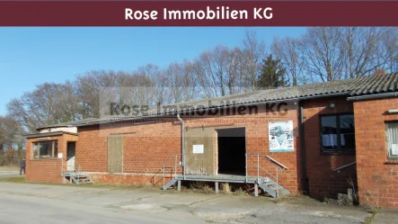 Außenansicht Lager - Halle/Lager/Produktion kaufen in Warmsen - ROSE IMMOBILIEN KG: Gewerbeimmobilie mit großem Grundstück in Warmsen zu verkaufen!