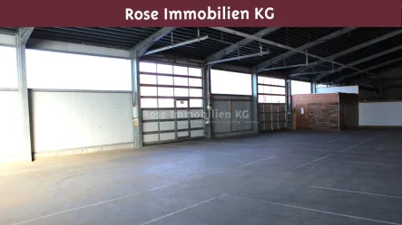 Rolltore - Halle/Lager/Produktion mieten in Hille - ROSE IMMOBILIEN KG: stützenfreie Kalthalle mit zwei großen Sektionaltoren!