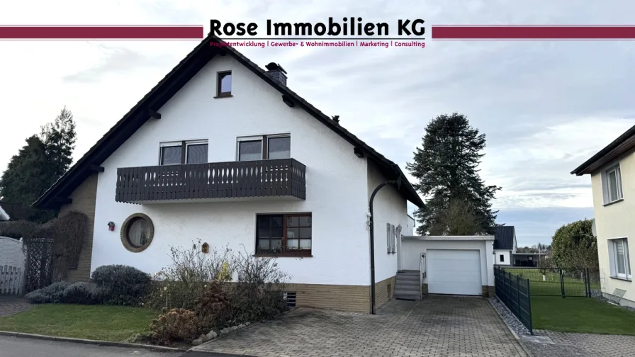 Außensicht - Haus kaufen in Lübbecke - Charmantes Einfamilienhaus mit barrierefreiem Erdgeschoss in ruhiger Lage von Lübbecke!