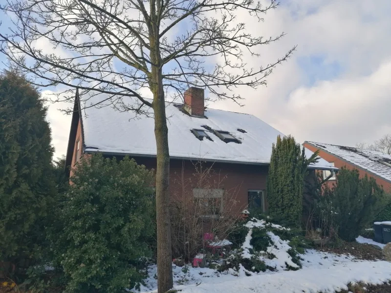 Haus-Frontansicht - Haus kaufen in Beckum - Einfamilienhaus in Beckum in ruhiger Wohnlage am Ortsrand - Erbpachtgrundstück