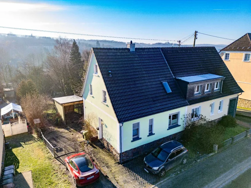 Ansicht - Haus kaufen in Waldbröl - Gemütliche Doppelhaushälfte mit großem Garten in Waldbröl