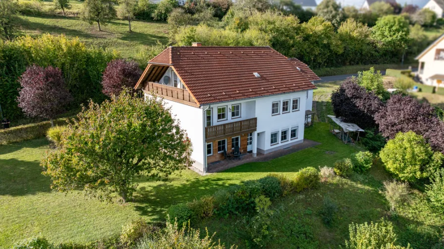  - Haus kaufen in Rittersdorf - Gepflegtes Einfamilienhaus mit Einliegerwohnung in Höhenlage von Rittersdorf bei Bitburg.