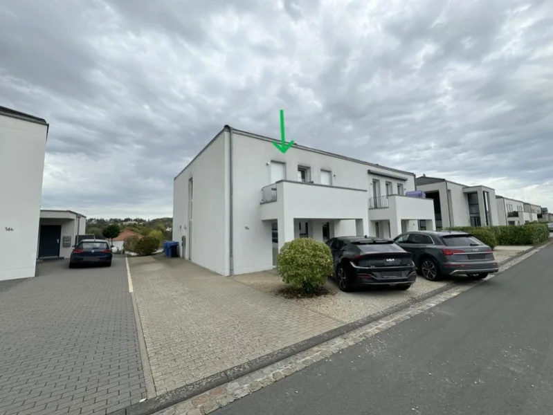 Straßenansicht - Wohnung kaufen in Bitburg - Moderne Eigentumswohnung in in ruhiger Lage in Bitburg-Monental.