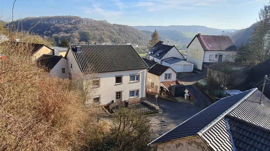  - Haus kaufen in Bettingen - Familienhaus mit großem Inneren und kleinem Garten in ruhiger Lage.