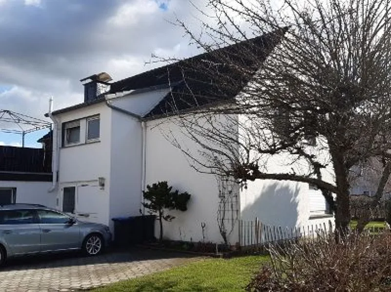 Frontansicht - Haus kaufen in Bad Sassendorf - Gepflegtes Zweifamilienhaus in Bad Sassendorf-Bettinghausen