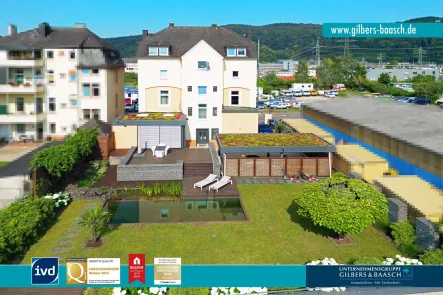 Mehrfamilienhaus in Trier - Haus kaufen in Trier - Trier: Exklusives Mehrfamilienhaus in Nähe zu Luxemburg mit neun Wohneinheiten, Moselblick und Pool