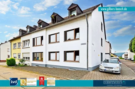 Titelfoto - Haus kaufen in Trier - Attraktives, vermietetes Mehrfamilienhaus mit ca. 4 % Rendite in TR-Pfalzel + 2 Garagen & Stellplatz