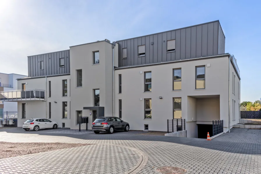 Vorderansicht 1 - Wohnung kaufen in Schweich - Moderne Wohnung mit Garten Schweich Stadtmitte KFW 40 Darlehen ab 2,13 %