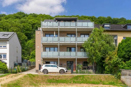 Rückansicht 1.HDR - Wohnung kaufen in Trier - Moderne Eigentumswohnung im Energiesparhaus Trier-Biewer mit Topanbindung nach Luxemburg