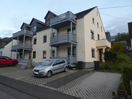 Ansicht 1 - Wohnung kaufen in Trier - Gut aufgeteilte Dachgeschoßwohnung  in Trier-Ruwer mit neuer Luft-Wärmepumpe 