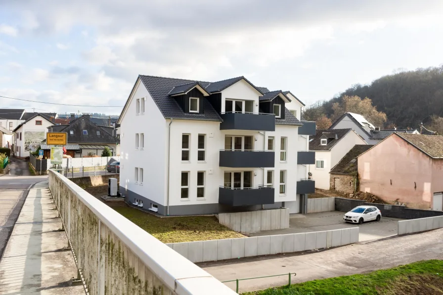 Ansicht Rückseite - Wohnung kaufen in Langsur - Modernes Wohnen mit herrlichem Blick auf die Sauer in Langsur - Nähe Wasserbillig