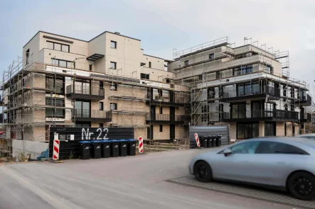 Straßenansicht - Wohnung kaufen in Trier - Moderne Wohnung mit Garten im Energiesparhaus Trier mit Top Verkehranbindung Luxemburg