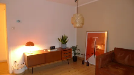 Wohnzimmer - Wohnung kaufen in Trier - Für Eigennutzer - Schöne 3 Zimmer-Wohnung im Dachgeschoss, geschützter Gemeinschaftsgarten vorhanden