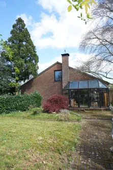 Seitenansicht mit Wintergarten - Haus kaufen in Wesel - Großzügiges Einfamilienhaus auf großem Grundstück in Wesel- Blumenkamp