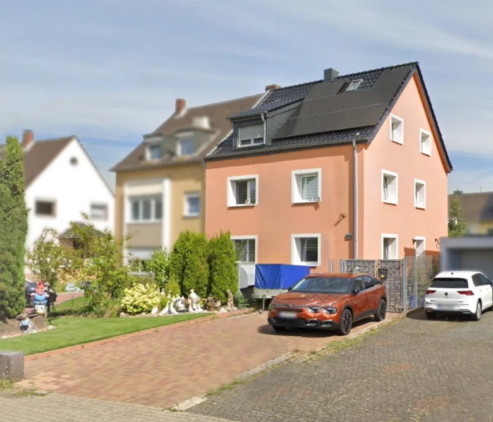 Hausansicht - Haus kaufen in Köln - Kernsaniertes Niedrigenergiehaus in Porz Eil