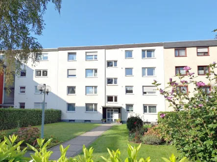 Hausansicht - Wohnung kaufen in Köln - Sonniges, modernes Wohnen in Porz Eil