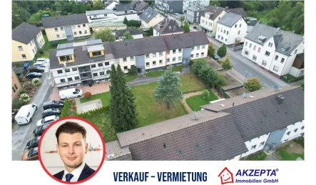 Wohngegend - Wohnung kaufen in Burscheid - 3-Zimmer-Wohnung in Burscheid - Sicher vermietet, eine lohnende Kapitalanlage!