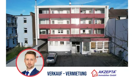 Vorderseite Wohnhaus - Zinshaus/Renditeobjekt kaufen in Leverkusen - Wohn- und Geschäftshaus in der Küppersteger Citymeile!