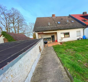  - Haus kaufen in Großbardorf - Doppelhaushälfte mit viel Potenzial in ruhiger Wohnlage mit Einliegerwohnung.
