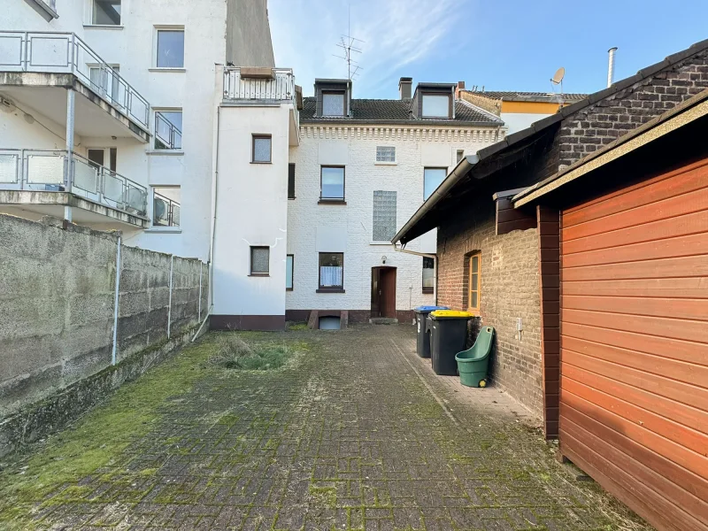 Gartenseite - Haus kaufen in Düsseldorf - vermietungssicheres Mehrfamilienhaus