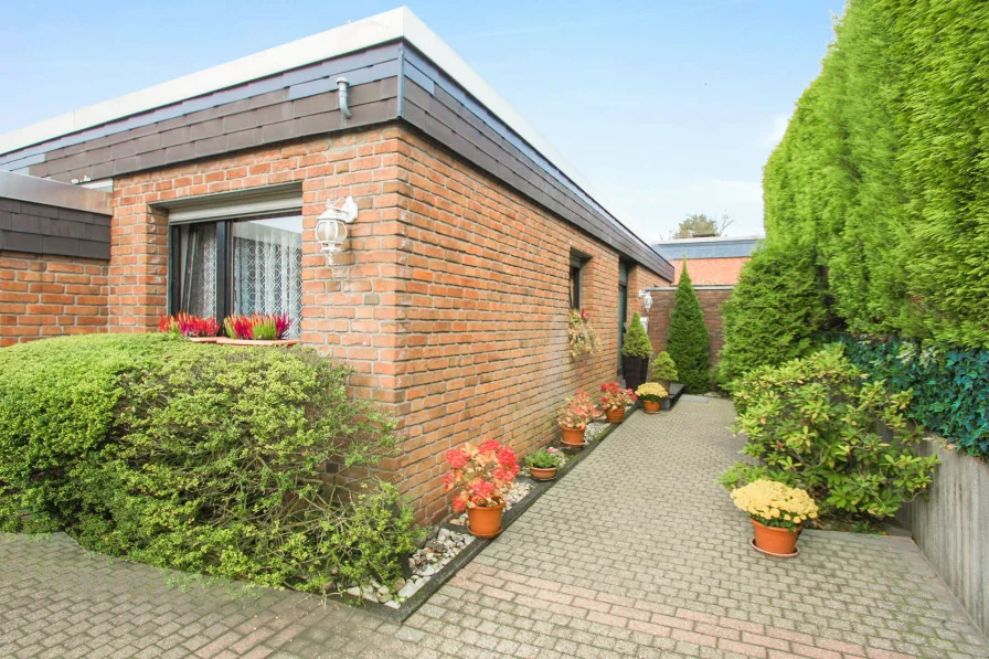 Ihr neues Zuhause  - Haus kaufen in Erkrath - Atrium-Bungalow mit Privatsphäre