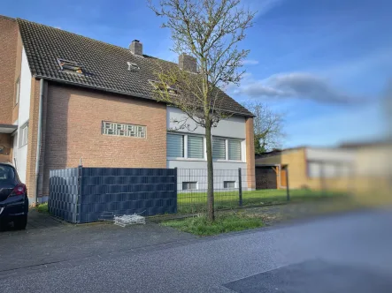 Strassenansicht - Haus kaufen in Inden-Schophoven - Vermietetes Einfamilienhaus in ruhiger Lage von Inden- Schophoven