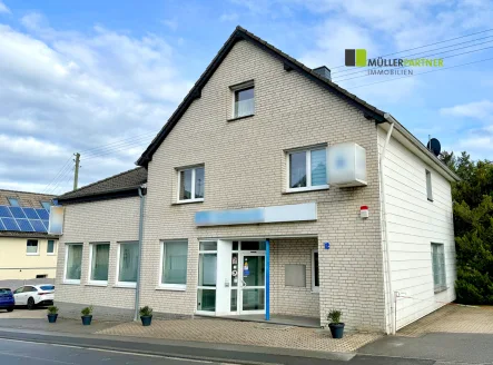 Frontansicht  - Zinshaus/Renditeobjekt kaufen in Nideggen-Schmidt - Wohn-/Geschäftshaus und sanierungsbedürftiges Wohnhaus in Niddeggen-Schmidt