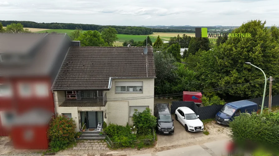 Frontansicht Drohne  - Haus kaufen in Langerwehe - Verklinkertes Einfamilienhaus in ruhiger Wohnlage von Langerwehe-Heistern