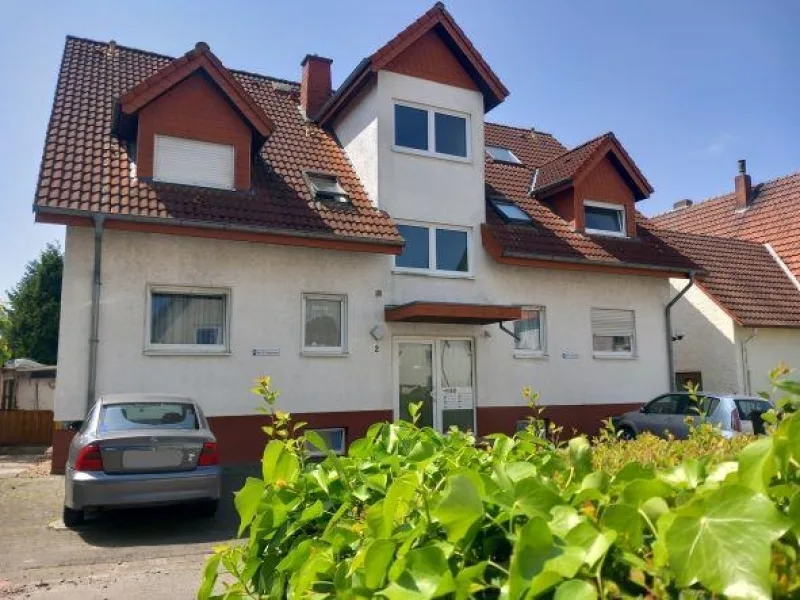 Ansicht - Zinshaus/Renditeobjekt kaufen in Löhne - 4-Familienhaus
