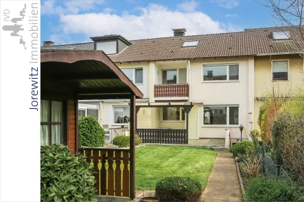 001 - Gartenansicht - Haus kaufen in Bielefeld - Bi-Heepen - Sackgasse: Familienfreundliches Reihenhaus mit Vollkeller und Garage
