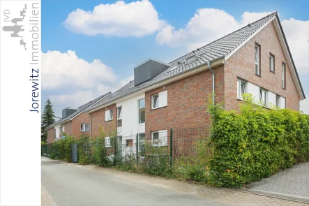 001 - Seitenansicht Haus A und B - Wohnung kaufen in Bielefeld - Erstbezug in Bi-Stieghorst: Sehr gut aufgeteilte 4 Zimmer-Wohnung inkl. Garage und Balkon