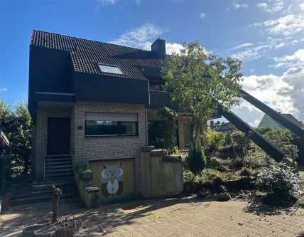 Hausansicht - Haus kaufen in Bünde - Haus mit großem Grundstück - Familien willkommen!