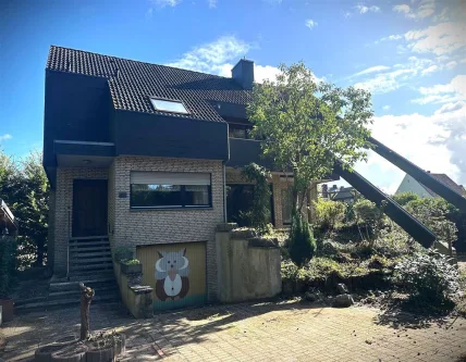 Hausansicht - Haus kaufen in Bünde - Haus mit großem Grundstück - Familien willkommen!