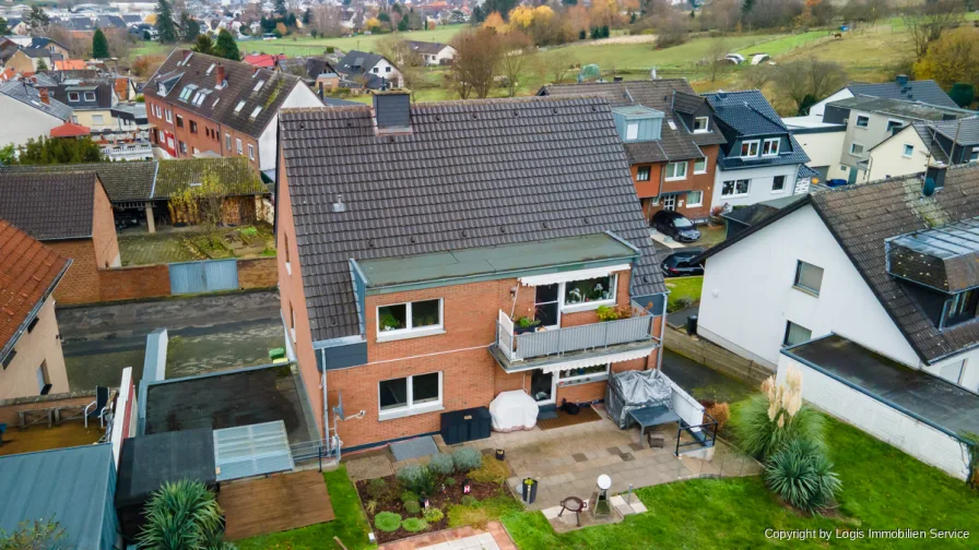 Titelbild - Haus kaufen in Bornheim / Kardorf - Hervorragend gepflegtes Zweifamilienhaus (freistehend) mit großem Grundstück in Bornheim-Kardorf