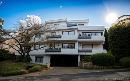 Titelbild - Wohnung kaufen in Bonn / Mehlem - Charmante Erdgeschosswohnung mit Terrasse und Top-Lage am Naturschutzgebiet Rodderberg