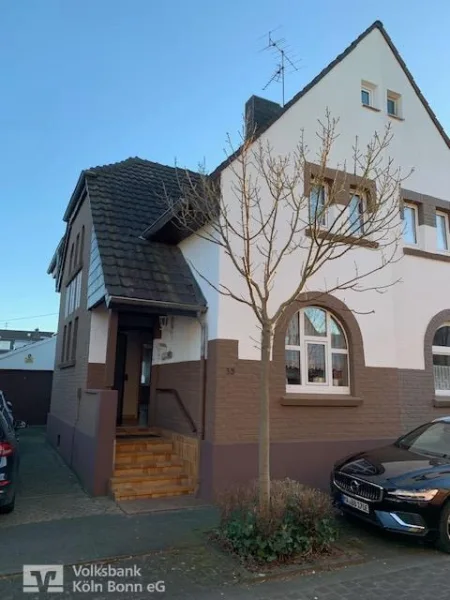 Ansicht - Haus kaufen in Troisdorf - Troisdorf Oberlar - Charmantes Einfamilienhaus mit kleinem Garten in sehr beliebter Lage!