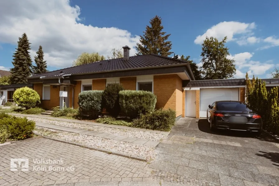  - Haus kaufen in Köln - Schöner, sanierter Bungalow mit Garage in Porz-Eil