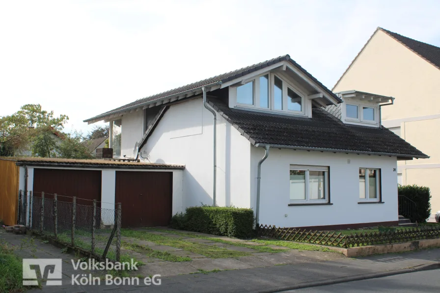 Ansicht - Haus kaufen in Königswinter - Königswinter-Oberdollendorf - Freistehendes Einfamilienhaus mit Potenzial und schönem Grundstück!