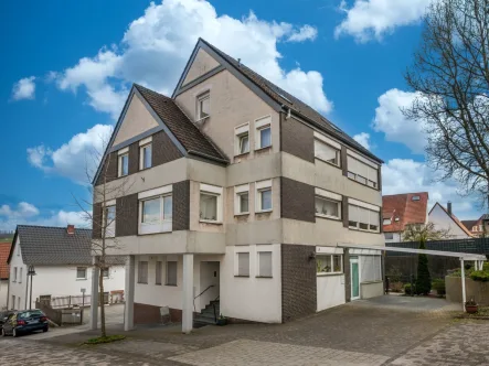 Außenansicht1 - Haus kaufen in Büren - WOHN-/GESCHÄFTSHAUS MIT GUT VERMIETETER PRAXIS UND EIN BIS ZWEI WOHNEINHEITEN MIT GARTEN UND GARAGE