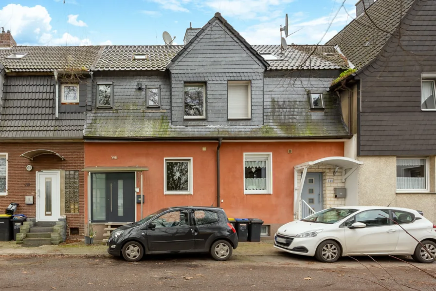 Frontansicht - Haus kaufen in Castrop-Rauxel - Reihenmittelhaus mit Garage und tollem Grundstück in ruhiger Lage!